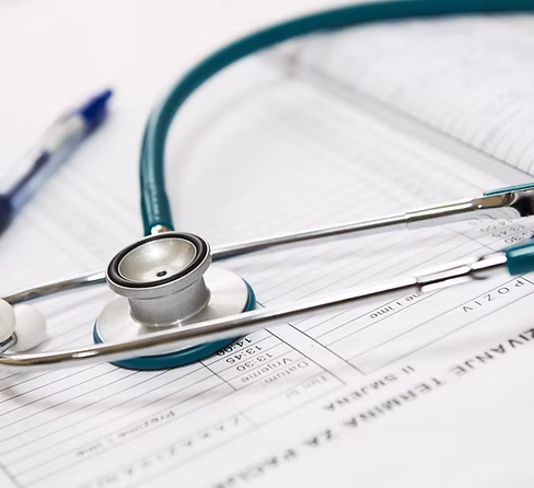 Stethoscope on clinical forms